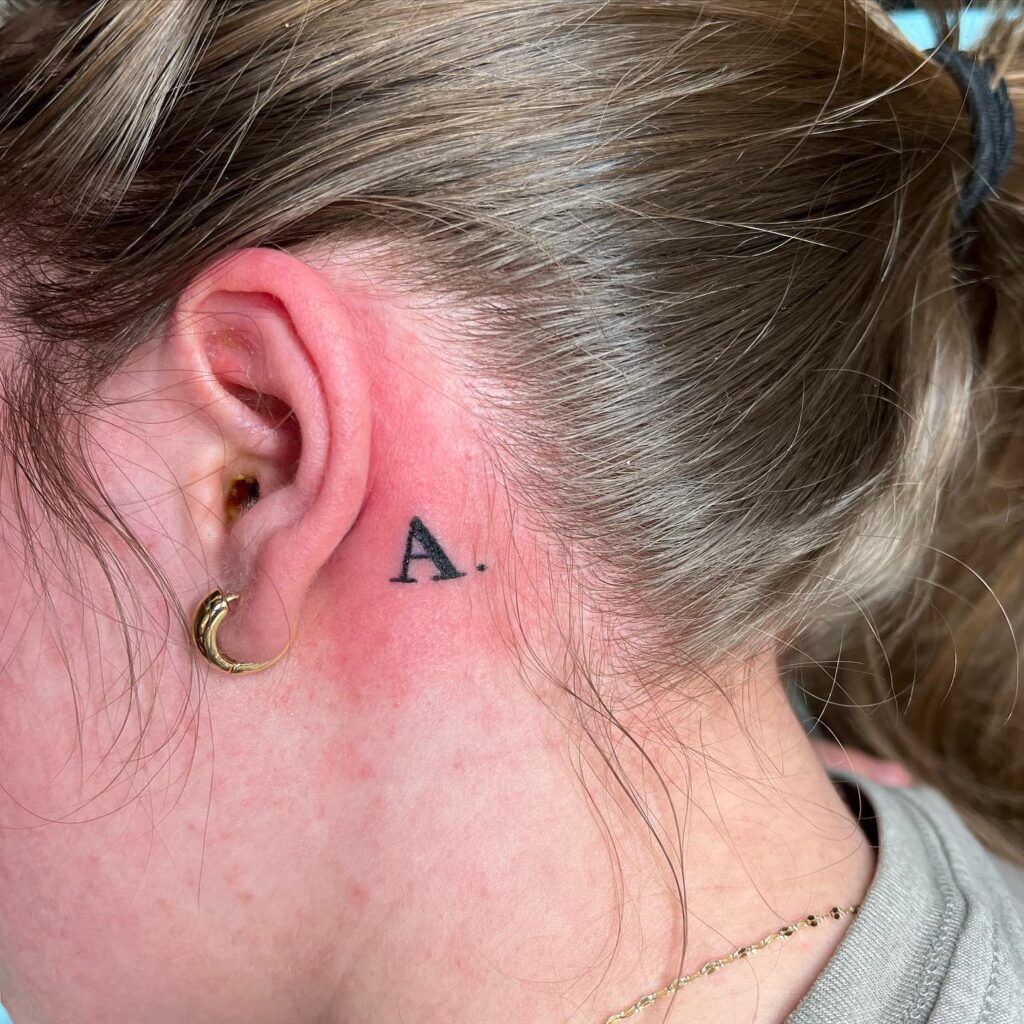 'A.' Text Lettering Tattoo Behind the Ear: Ear Statement