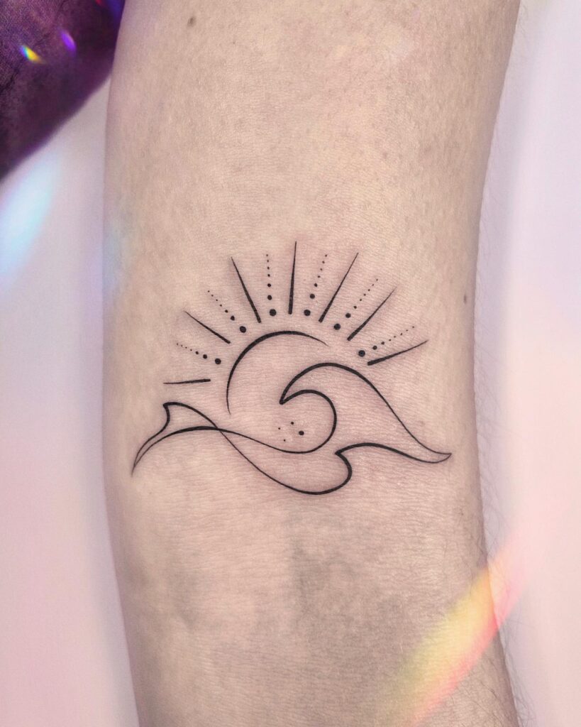 Above elbow sun and wave tattoo minimalist ink