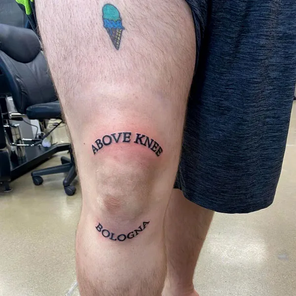 Above knee bologna tattoo