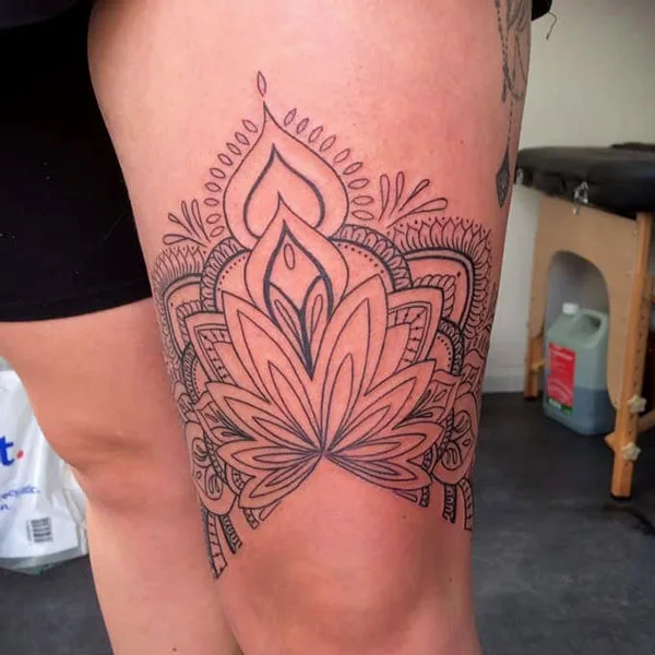 Above knee mandala tattoo