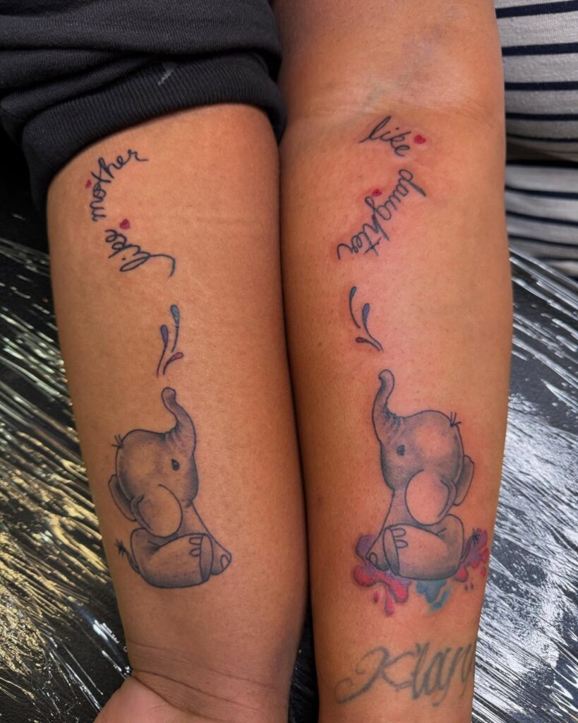 Adorable Elephant Mother Daughter Tattoos with Watercolor and Cursive Script
