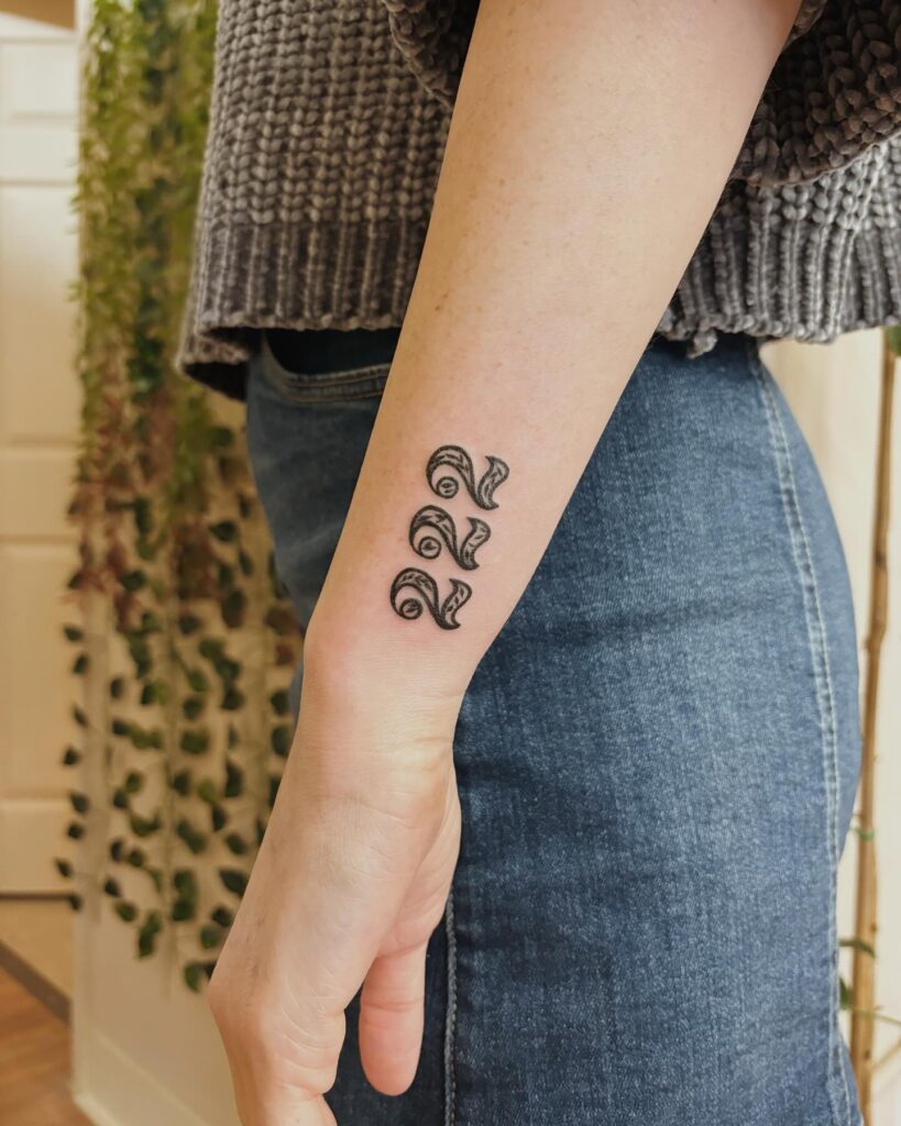 Angel Number 222 Tattoo on the Side of the Wrist, a Personalized Emblem: Custom Code 