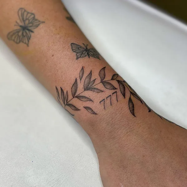 Angel number tattoo 49
