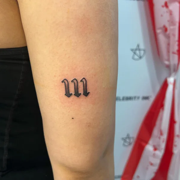 Angel number tattoo 52