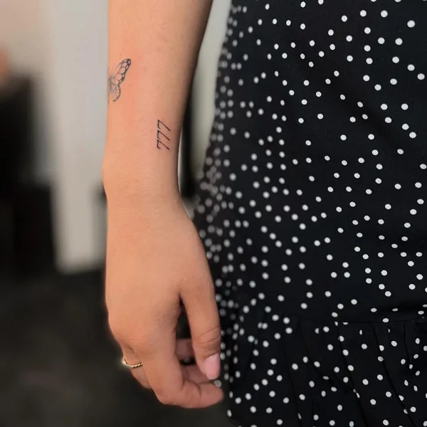 Angel number tattoo 58