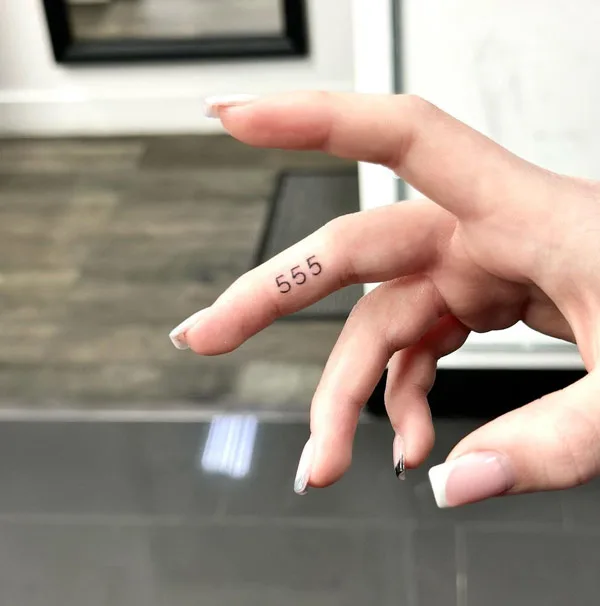 Angel number tattoo 70