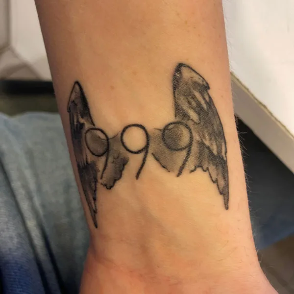 Angel wings 999 tattoo 1
