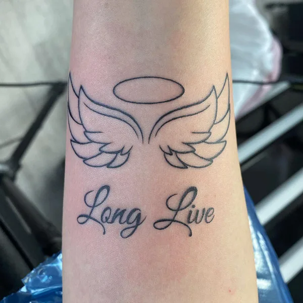 Angel wings and halo tattoo