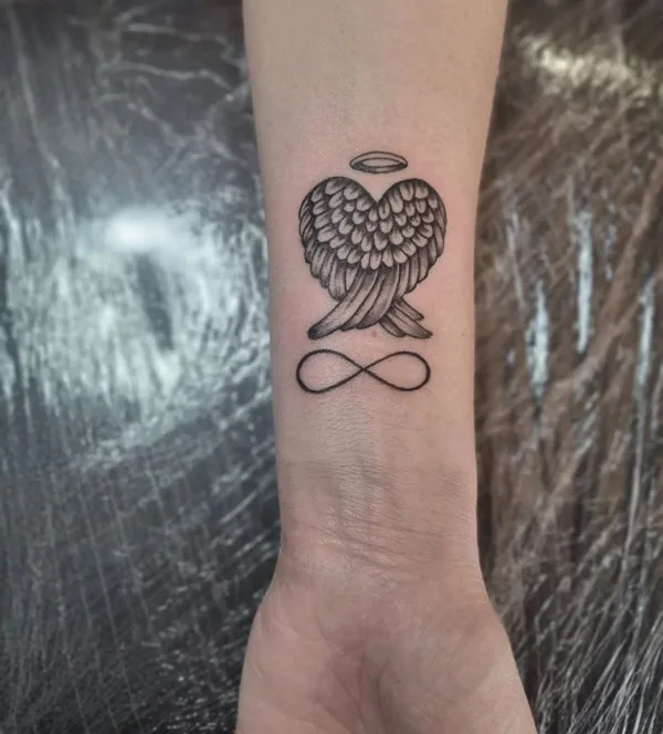 Angel wings infinity tattoo