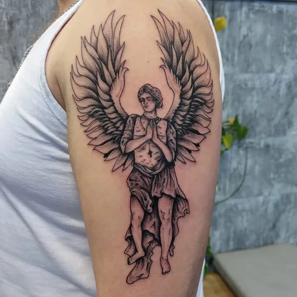 Angel wings tattoo on arm 1