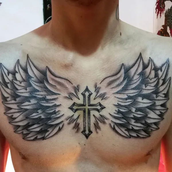 Angel wings tattoo on chest 2