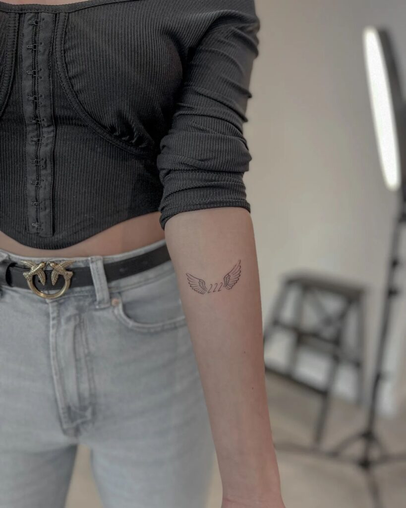 Angel Wings with 222 Number Tattoo on the Below the Inner Forearm, a Spiritual Symbol: Winged Wonder 