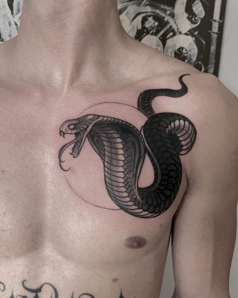 Angry Cobra Chest Tattoo in Black and Grey, Mouth Ajar: Pectoral Majesty