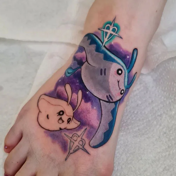 Anime foot tattoo