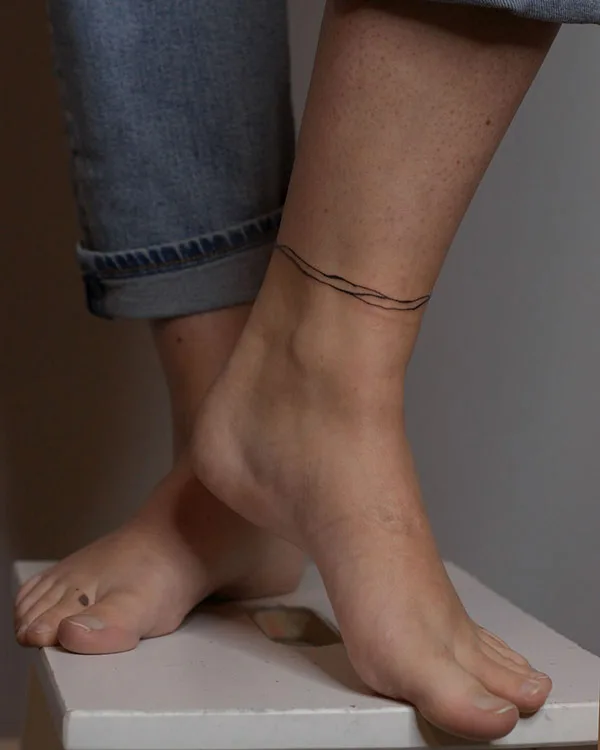 Ankle bracelet tattoo 49