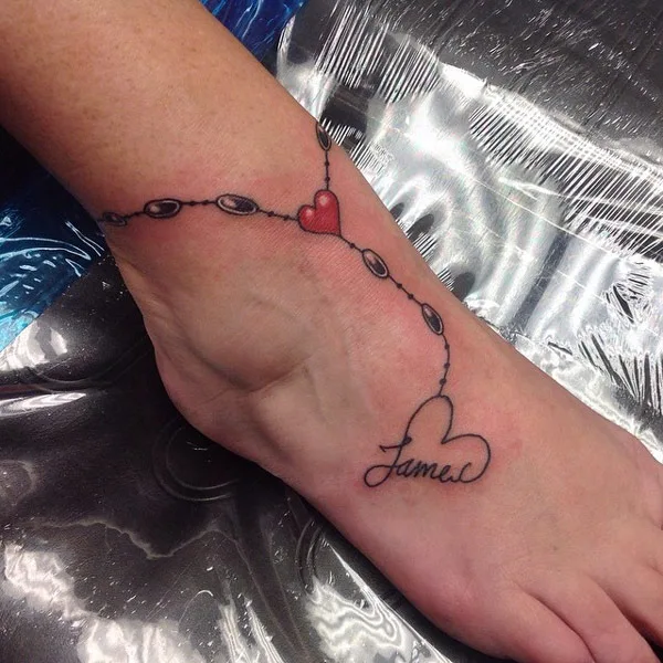 Ankle bracelet tattoo with names
