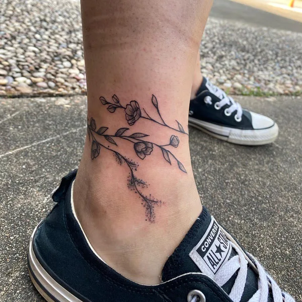 Ankle charm bracelet tattoo