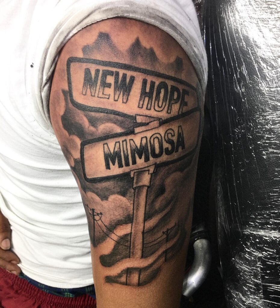 Arm art with a twist new hope and mimosa street signs tattoo