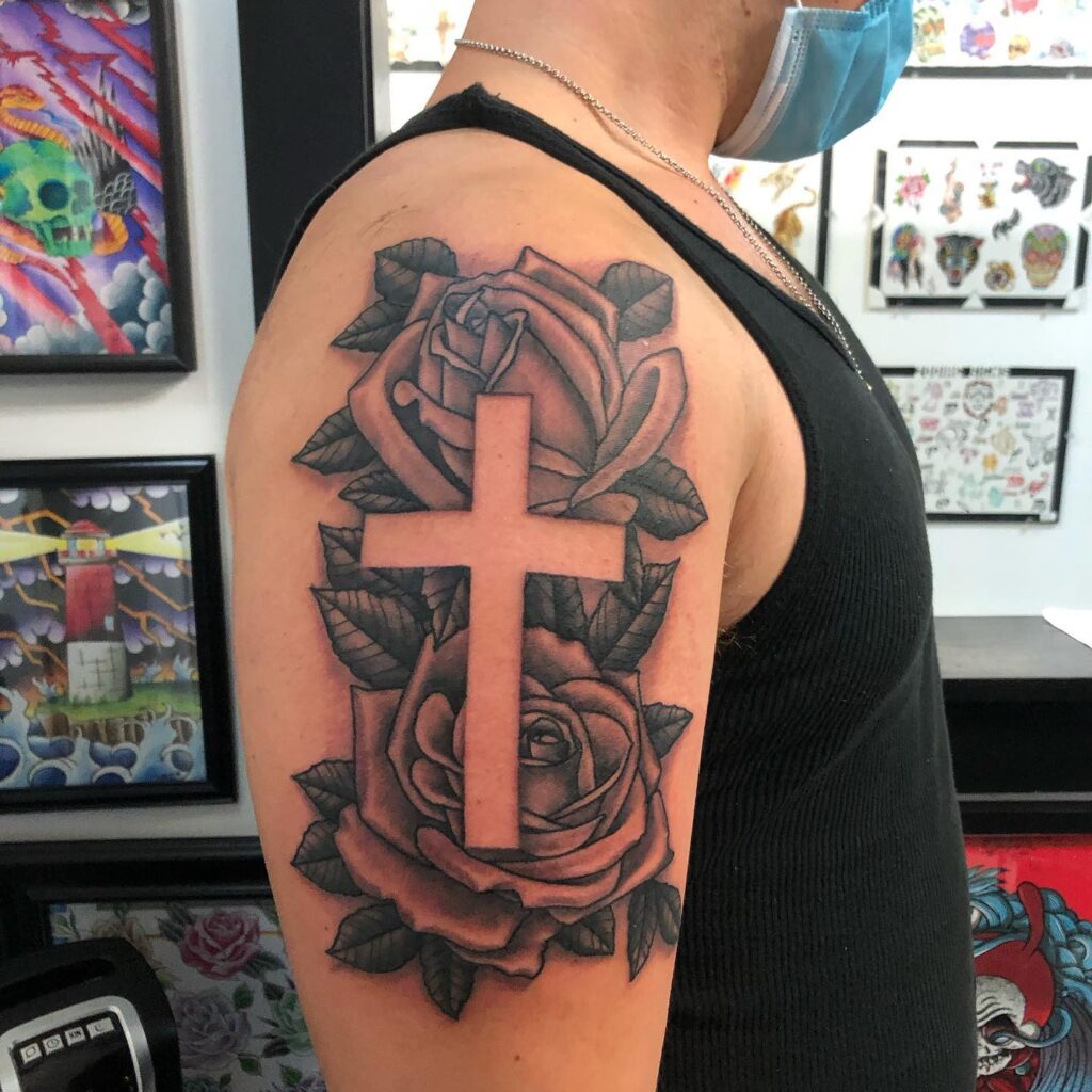Arm Tattoo Roses with Negative Cross, a Symbolic Bouquet: Cross of Thorns