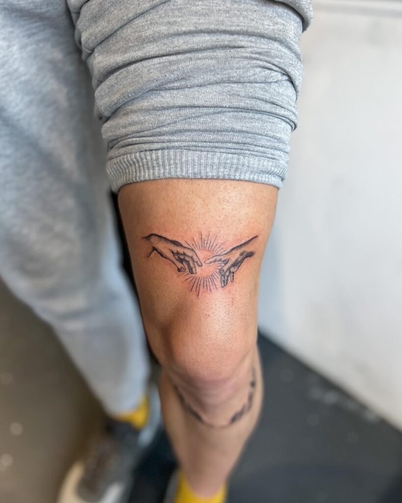 Artistic Minimalist Michelangelo Tattoo Embrace Creativity Above the Knee