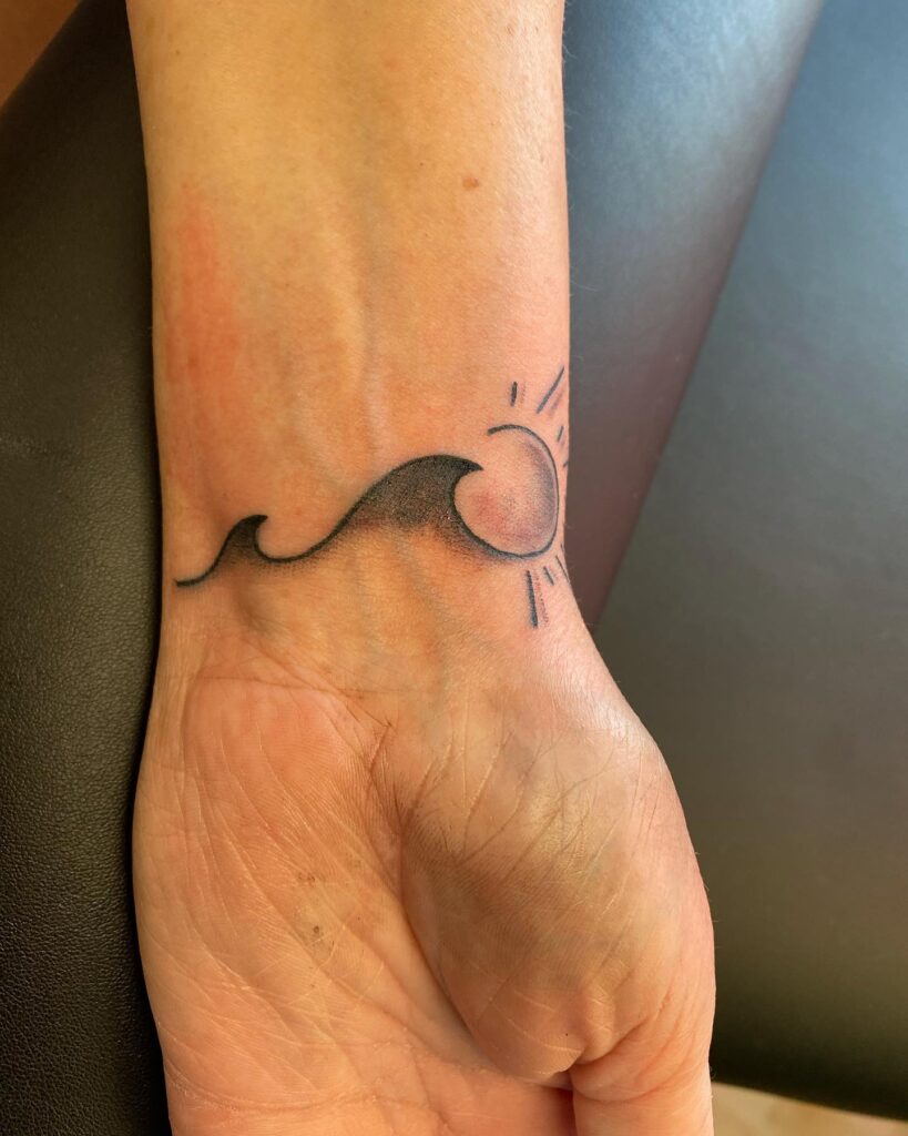 Artistic Wrist Ink: Wave and Sun Tattoo Ideas for a Cool Vibe