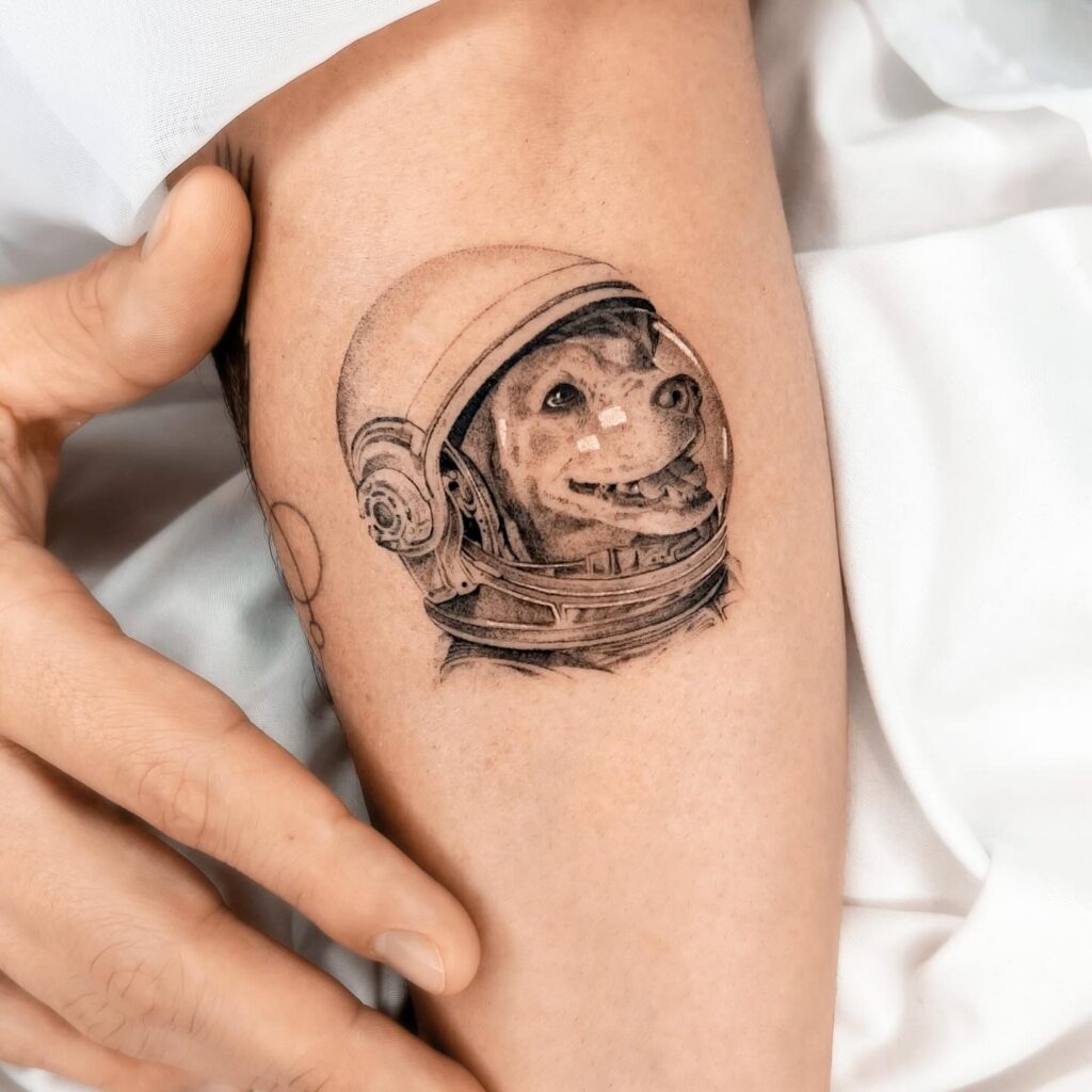 Astronaut Dog Portrait in Black and Grey on the Upper Arm: Interstellar Companion