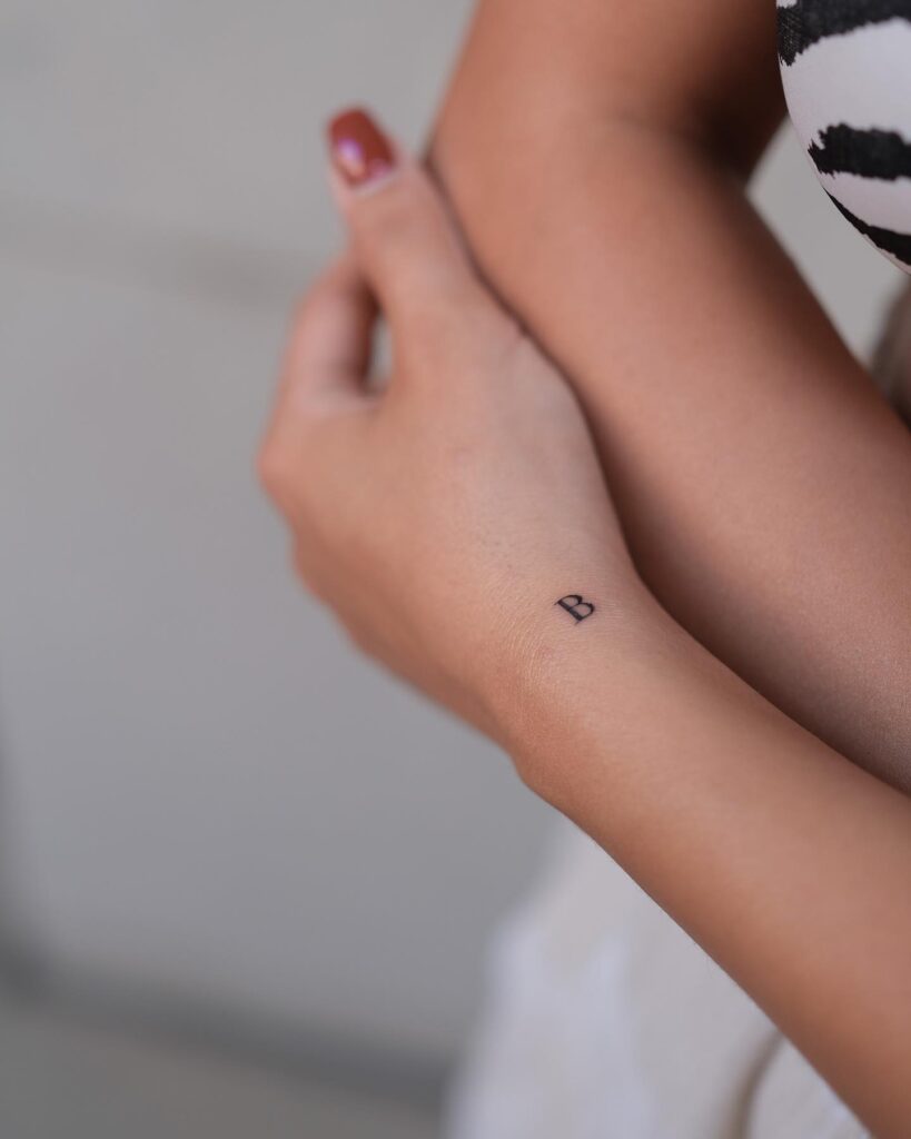 B letter tattoo on the side wrist for girls a personal statement