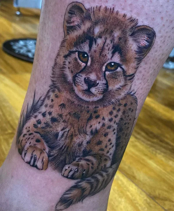 Baby cheetah tattoo