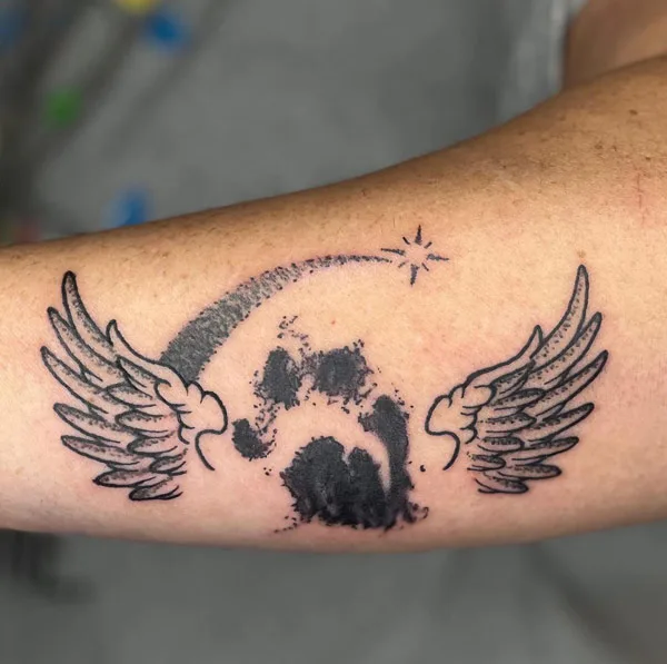 Baby feet angel wings tattoo