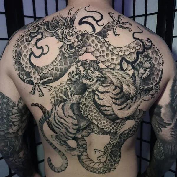 Back dragon and tiger tattoo