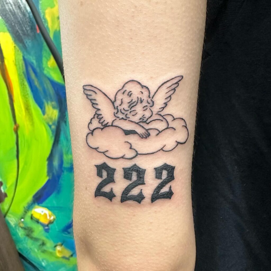 Back of the Above Elbow Sleeping Angel Tattoo with 222, a Serene Combination: Angelic Rest 
