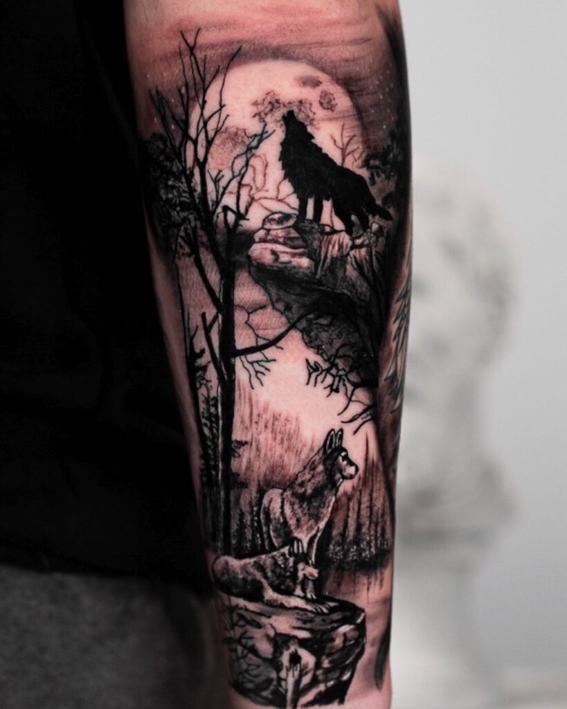 Back of the forearm forest wolf and mountain scene tattoo for men immersive wilderness
