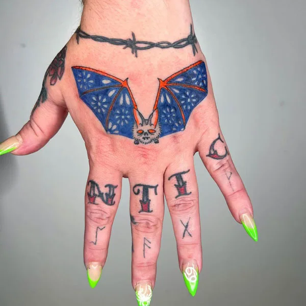 Bat tattoo on hand