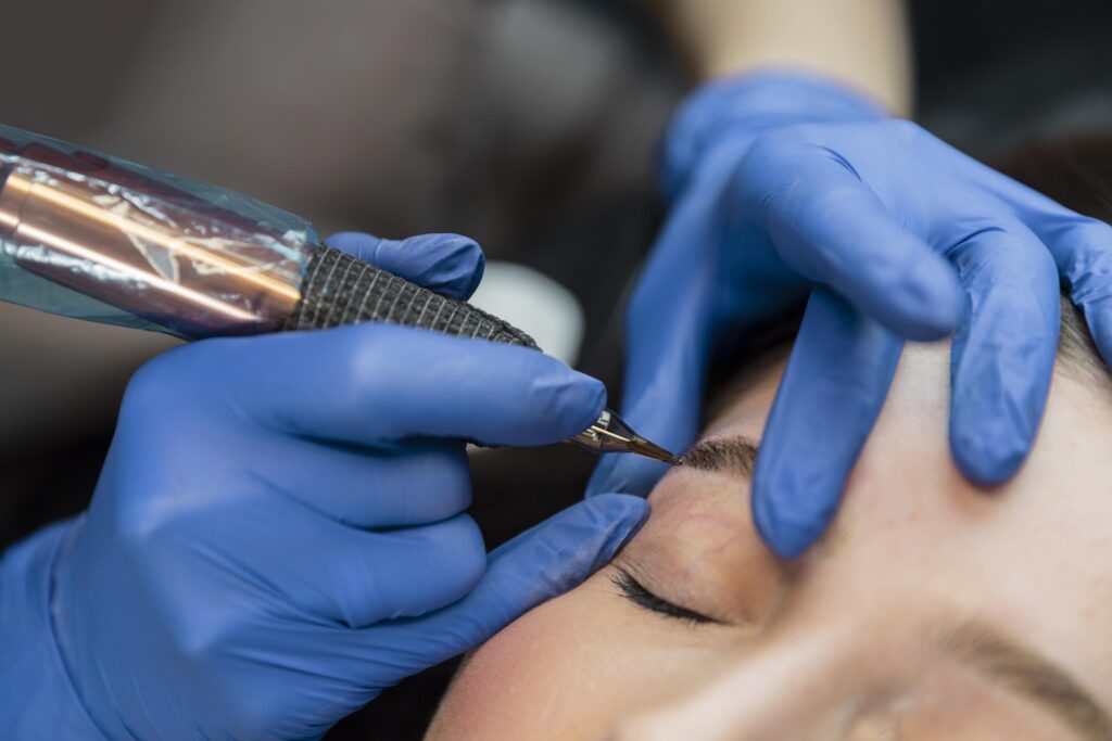 Beautician Doing Eyebrow Treatment Her Female Client