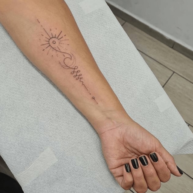 Beautiful cosic wave and sun tattoo for arm image