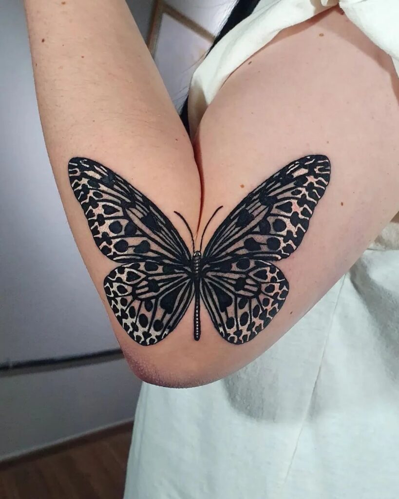Beautiful folding elbow butterfly tattoo