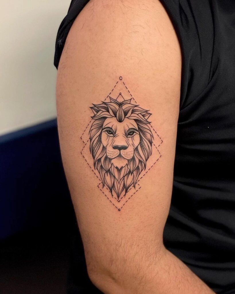 Beautiful lion head geometric tattoo, exquisitely detailed and clean, gracefully positioned on the upper arm geometric glory