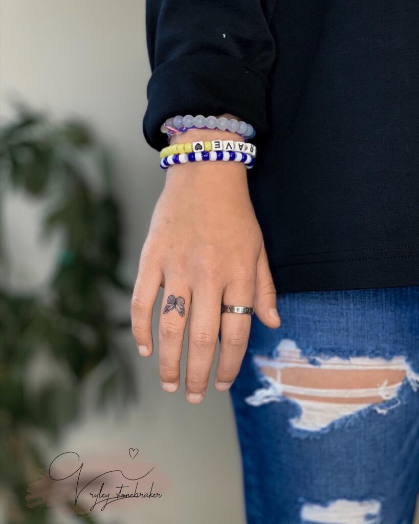 Beautiful small butterfly tattoo on the ring finger butterfly grace
