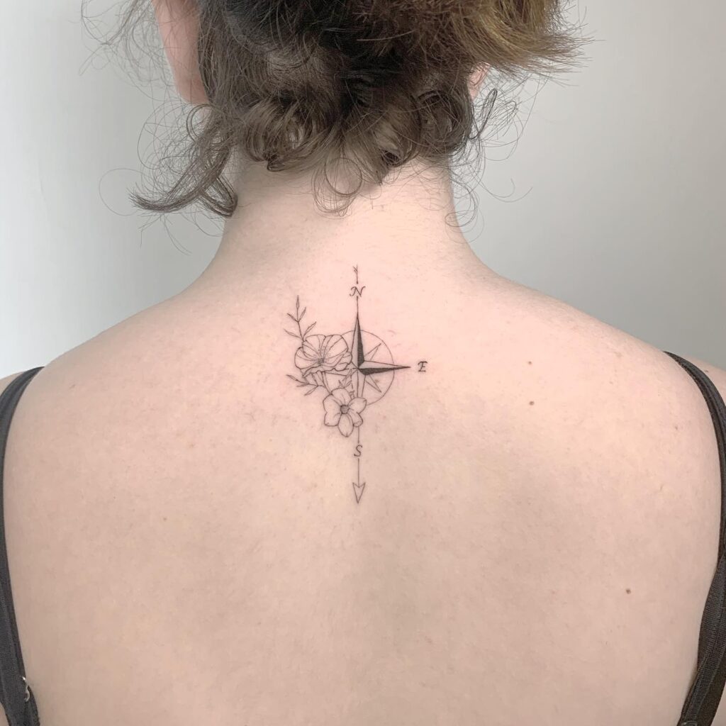 Beauty & guidance half compass half flower neck tattoo