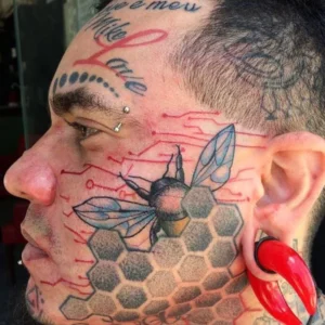 Bee face tattoo 1