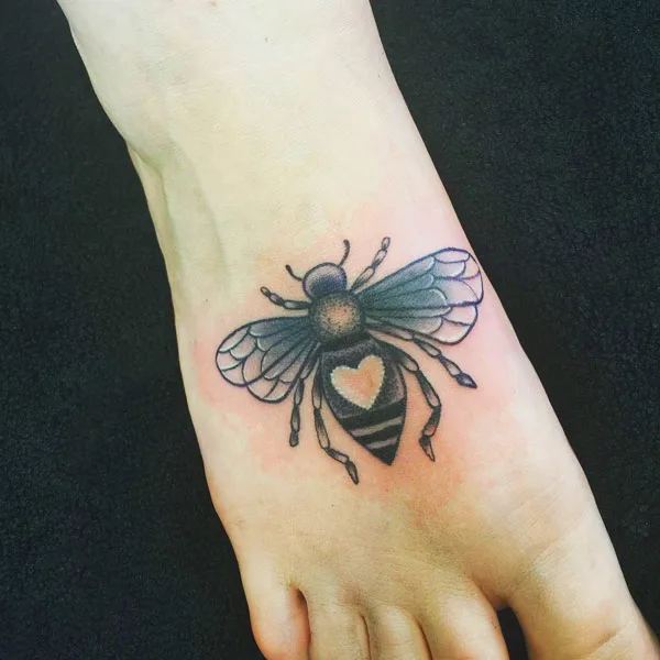 Bee tattoo on foot