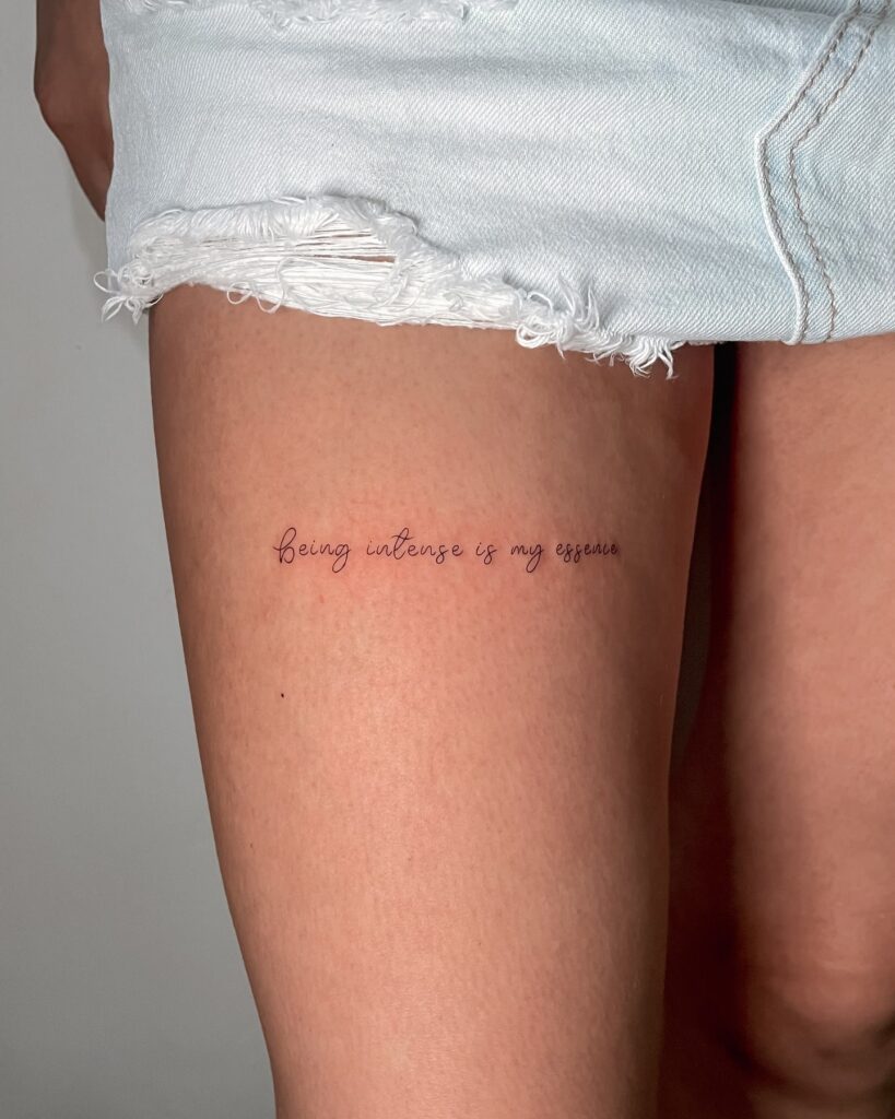 'Being Intense Is My Essence' Fineline Text Tattoo on the Thigh, a Bold Statement: Essence Echo