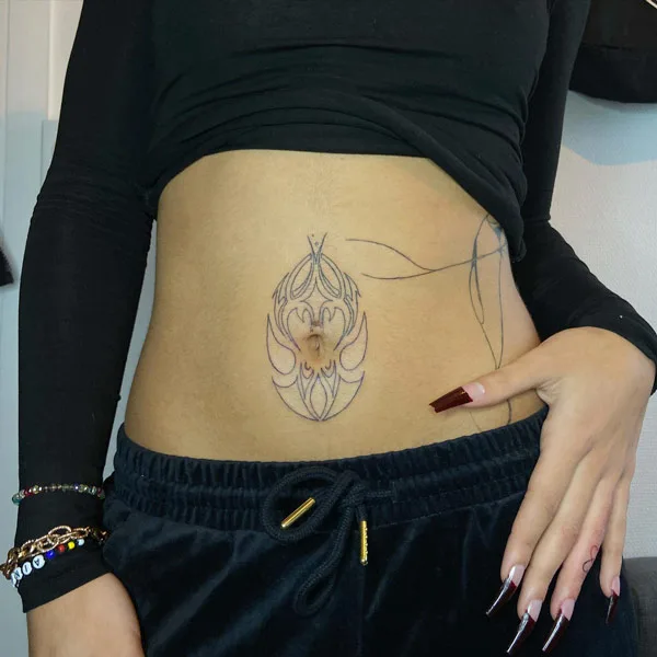 Belly button tattoo 13