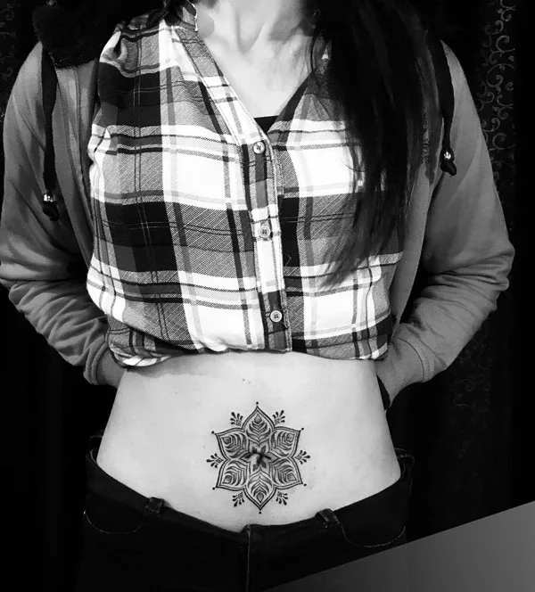 Belly button tattoo 21