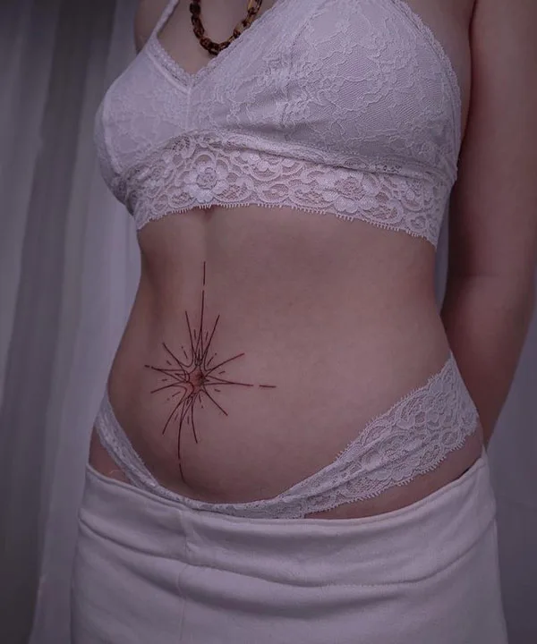 Belly button tattoo 24