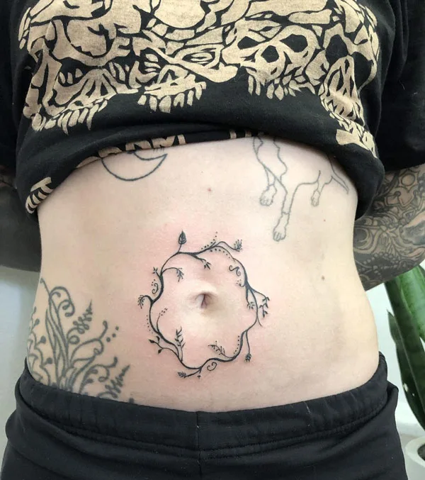 Belly button tattoo 38