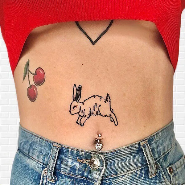 Belly button tattoo 4