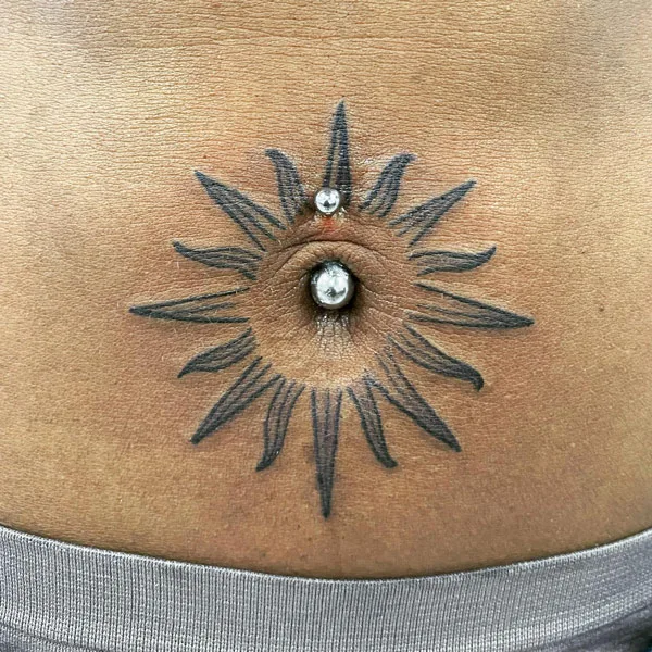 Belly button tattoo 55