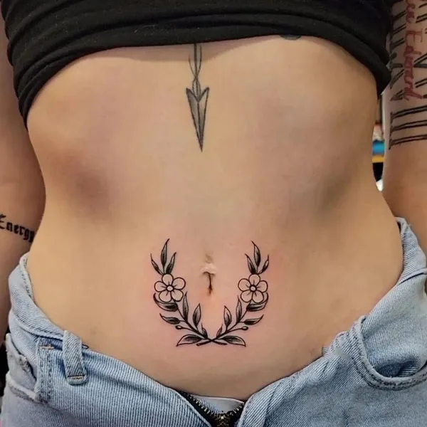 Belly button tattoo 7