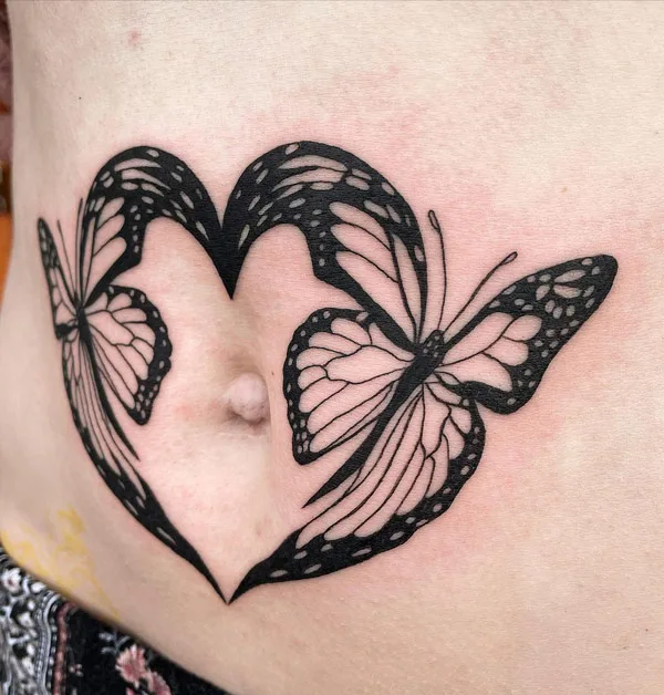 Belly button tattoo 9
